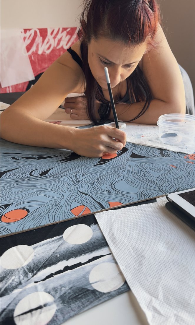 Elisa painting in the studio